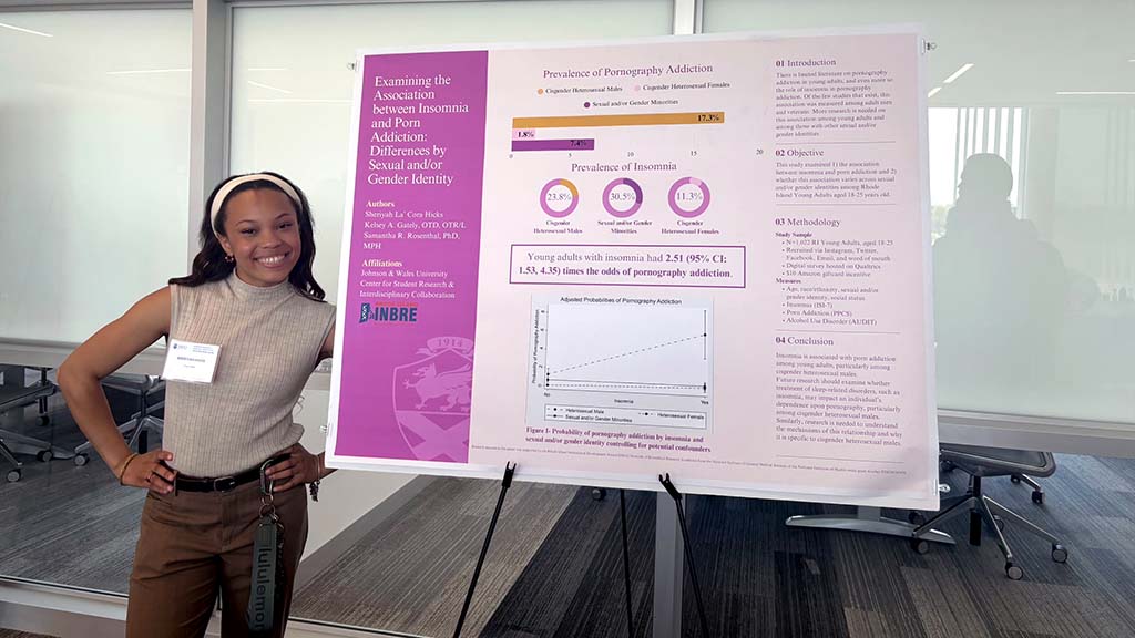 Sheriyah “Cora” Hicks with her poster presentation at the 2025 Student Research, Design & Innovation Symposium. 